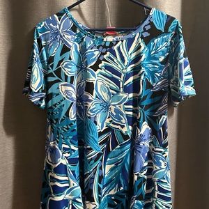 Green, Turquoise & black top with lace on the back. Cute shirt.